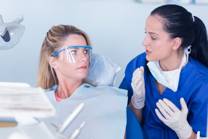 patient at dentist for knocked out tooth